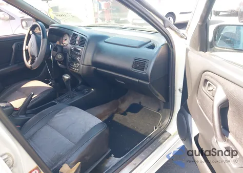 2002 Infiniti G20 Luxury z USA, uszkodzony, nr VIN JNKCP11A62T507040